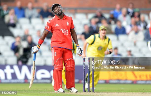 England's Michael Carberry shows his dejection after being caught out by Australia's Michael Clarke form Michell Johnson during the Second One Day...