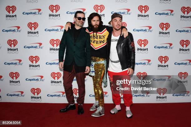 Tomo Milicevic, Jared Leto, and Shannon Leto of music group Thirty Seconds to Mars attend the 2017 iHeartRadio Music Festival at T-Mobile Arena on...