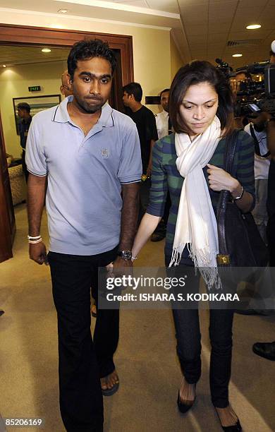 Sri Lankan skipper Mahela Jayawardene his wife Christina Sirisena arrive in Colombo on March 04, 2009 after escaping a terrorist attack in an ambush...
