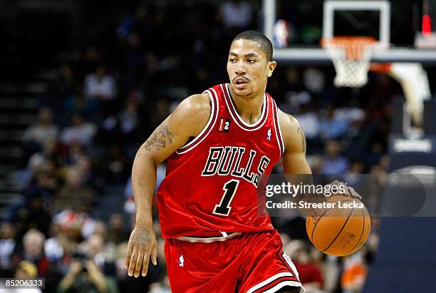 Derrick Rose of the Chicago Bulls dribbles the ball against the Charlotte Bobcats during their game at Time Warner Cable Arena on March 3, 2009 in...