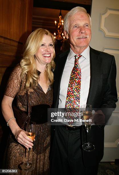 Media mogul Ted Turner and novelist Elizabeth Dewberry attend the Fortune Forum Summit cocktail party, at the Dorchester Hotel on March 3, 2009 in...