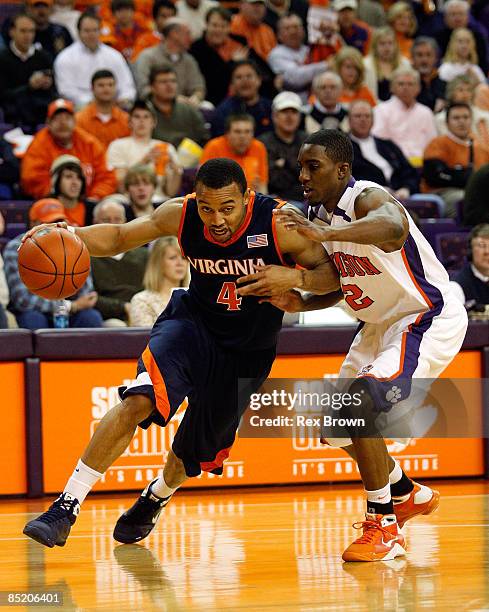 Demontez Stitt of the Clemson Tigers defends as Calvin Baker of the Virginia Cavaliers works to drive inside at Littlejohn Coliseum on March 3, 2009...