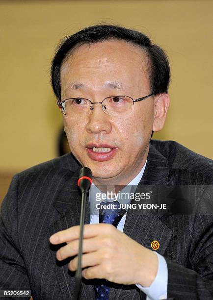 South Korean Unification Minister Hyun In-Taek talks to reporters during an informal news conference in Seoul on March 4, 2009. North Korea is...