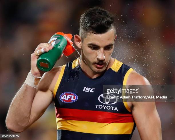 Taylor Walker of the Crows sprays water on his face during the 2017 AFL First Preliminary Final match between the Adelaide Crows and the Geelong Cats...