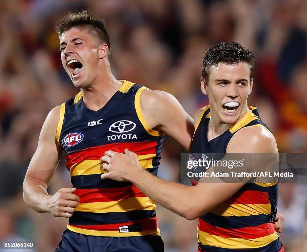 Paul Seedsman of the Crows celebrates a goal with Riley Knight of the Crows during the 2017 AFL First Preliminary Final match between the Adelaide...