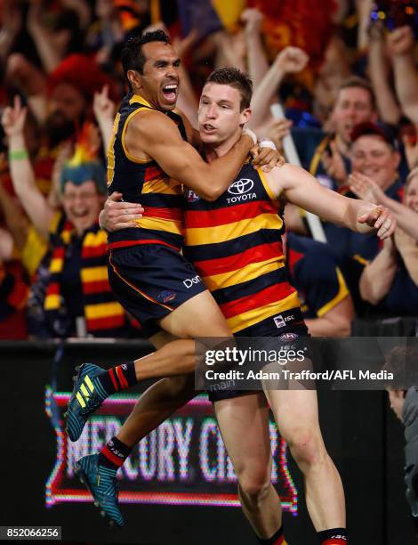 Josh Jenkins of the Crows celebrates a goal with Eddie Betts of the Crows during the 2017 AFL First Preliminary Final match between the Adelaide...