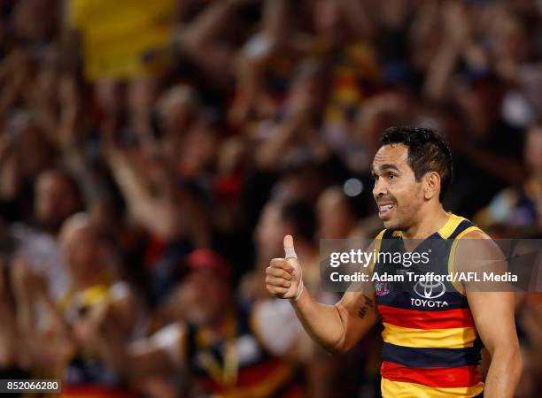 Eddie Betts of the Crows congratulates Charlie Cameron of the Crows on a goal during the 2017 AFL First Preliminary Final match between the Adelaide...