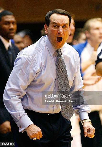 Head coach Mike Krzyzewski of the Duke Blue Devils cheers toward the fans to pump them up against the Florida State Seminoles during the game on...