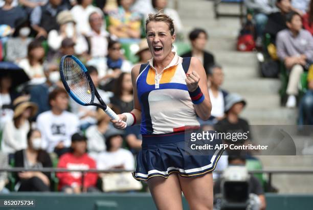 Anastasia Pavlyuchenkova of Russia celebrates her win over Angelique Kerber of Germany following their women's singles semi-final match at the Pan...