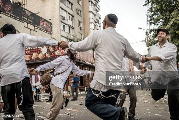 Orthodox Jewish pilgrims dance while celebrating Rosh Hashanah in Uman, about 200 km South of Kyiv, Ukraine, on 22 September 2017. Every year,...