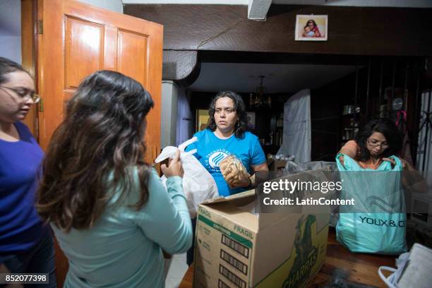 Group of 20 volunteers of UNAM and Tec de Monterrey students led by Dr. Tihui Campos, get ready to help, they have gathered every night since the day...