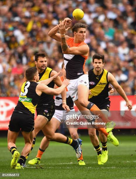 Rory Lobb of the Giants handballs during the Second AFL Preliminary Final match between the Richmond Tigers and the Greater Western Sydney Giants at...