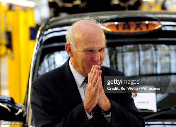 Secretary of State for Business, Innovation and Skills, Vince Cable, during a visit to The London Taxi Company, Coventry, as following its successful...