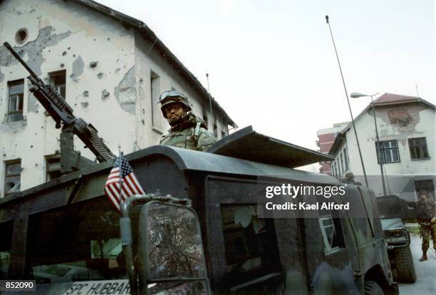 American SFOR soldiers patrol November 16, 2000 in the war-damaged city of Srebrenica, Bosnia. This year marks the fifth anniversary of the signing...