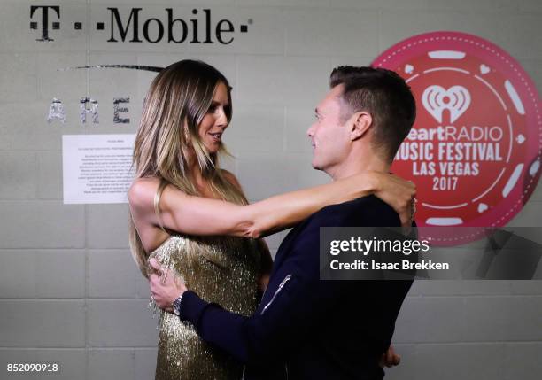 Heidi Klum and Ryan Seacrest attend the 2017 iHeartRadio Music Festival at T-Mobile Arena on September 22, 2017 in Las Vegas, Nevada.