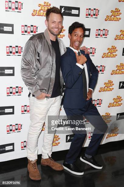 Actors Joel McHale and Danny Pudi attends the Premiere Of "The Tiger Hunter" at Laemmle Monica Film Center on September 22, 2017 in Santa Monica,...