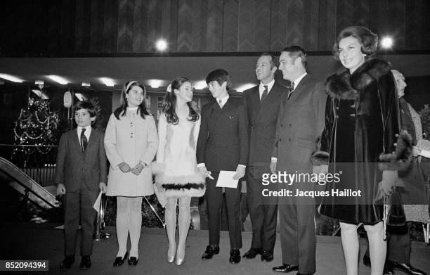 Liliane Bettencourt with Sargent Shriver, the USA ambassador in France and his children, Maria, Anthony and Timothy in Paris, 20th December 1968