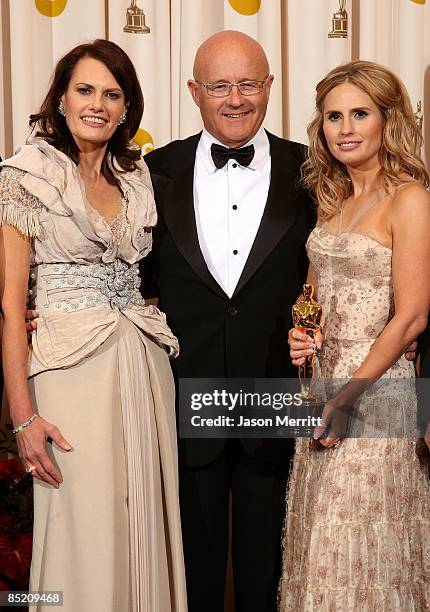 Family of late actor Heath Ledger, father Kim Ledger , mother Sally and sister Kate , pose in the press room after accepting the award for Best...