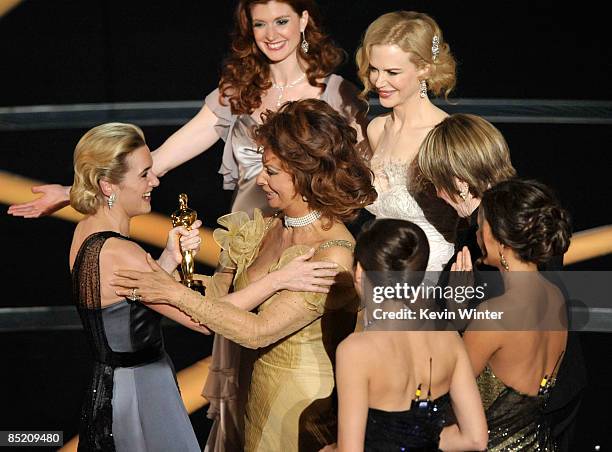 Actress Kate Winslet embraces presenter Sophia Loren after winning the Best Actress award for "The Reader" during the 81st Annual Academy Awards held...