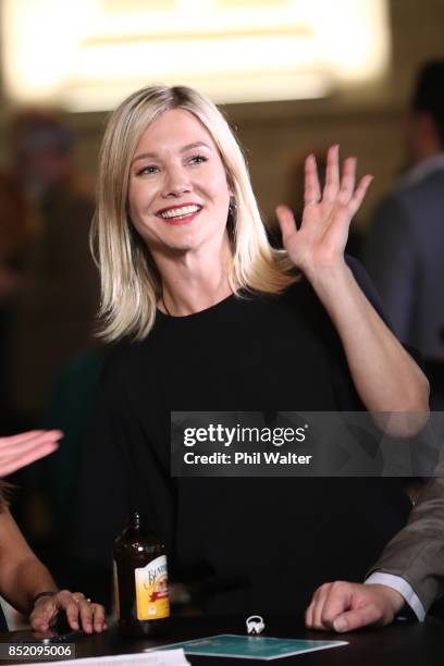 Green Party candidate Hayley Holt gives a wave at the Green Party election night function at St Matthews in the City Church on September 23, 2017 in...