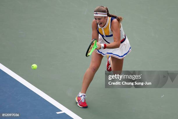 Jelena Ostapenko of Latvia plays a shot against Luksika Kumkhum of Thailand during day six of the KEB Hana Bank - Incheon Airport Korea Open at the...