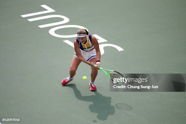 Jelena Ostapenko of Latvia plays a shot against Luksika Kumkhum of Thailand during day six of the KEB Hana Bank - Incheon Airport Korea Open at the...