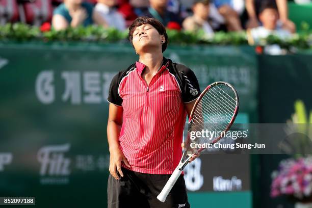 Luksika Kumkhum of Thailand reacts after a shot against Jelena Ostapenko of Latvia during day six of the KEB Hana Bank - Incheon Airport Korea Open...