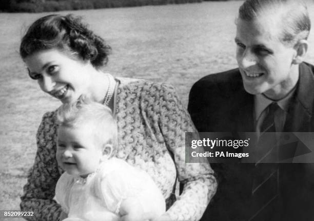 These pictures of eight year old Prince Charles and his Royal parents - Princess Elizabeth and the Duke of Edinburgh - are the most informal ever...