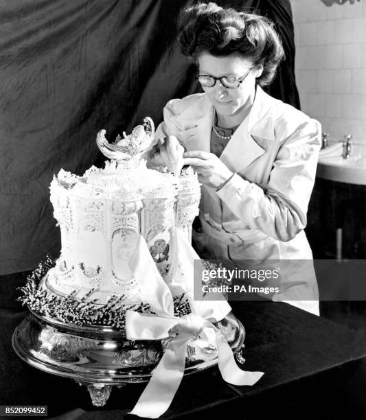 The top tier of Princess Elizabeth wedding cake is being used for the official cake for the Royal Christening. McVitie & Price, who made the wedding...