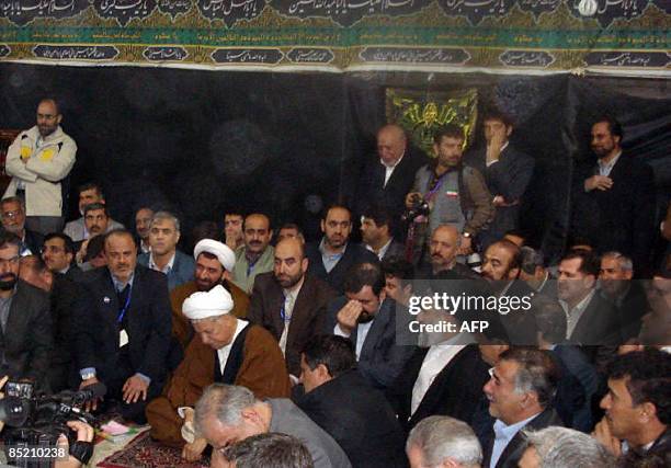 Former Iranian president Akbar Hashemi Rafsanjani prays the Shiite al-Askari Shrine in the northern mainly Sunni Muslim city of Samarra on March 3...