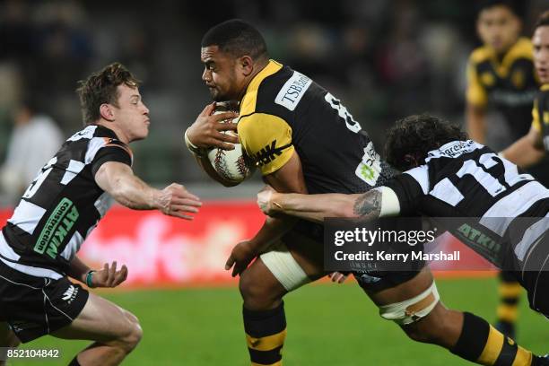 Toa Halafihi of Taranaki makes a break and scores a try during the round six Mitre 10 Cup match between Hawke's Bay and Taranaki at McLean Park on...