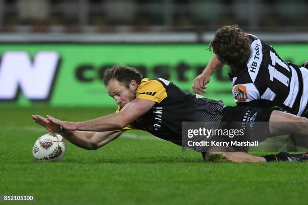 Marty McKenzie of Taranaki scores a try during the round six Mitre 10 Cup match between Hawke's Bay and Taranaki at McLean Park on September 23, 2017...