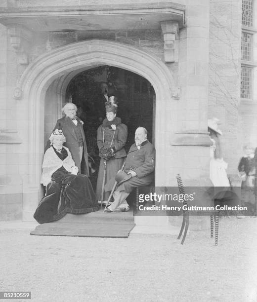 British statesman William Ewart Gladstone and his wife Catherine with the future King Edward VII and Queen Alexandra in the Golden Wedding Porch at...