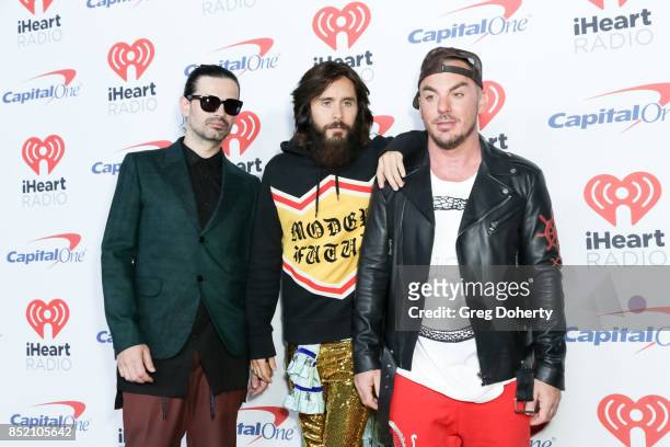 Tomo Milicevic, Jared Leto, and Shannon Leto of music group Thirty Seconds to Mars arrive at the 2017 iHeartRadio Music Festival at T-Mobile Arena on...