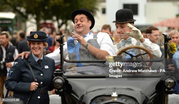 Two actors playing Laurel and Hardy entertain the crowd at the Goodwood Revival.