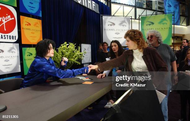 Michael Jackson & a fan at record signing
