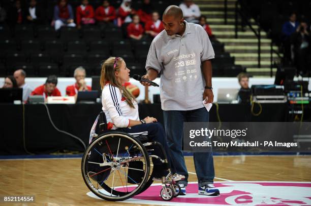 Hannah Cockroft speaks to the crowd during half time the wheelchair basketball on day two of the 2013 Sainsburys School Games at the Motorpoint...