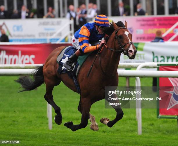 Zain Eagle ridden by James Doyle wins the Frank Whittle Partnership Classified Stakes during the Speedy Services Doncaster Cup Day of the Ladbrokes...