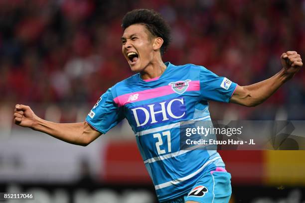 Kyosuke Tagawa of Sagan Tosu celebrates scoring his side's second goal during the J.League J1 match between Urawa Red Diamonds and Sagan Tosu at...