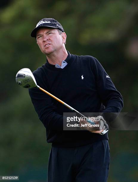 Davis Love III watches after hitting a tee shot during the third round of the Buick Invitational at the Torrey Pines Golf Course on February 7, 2009...