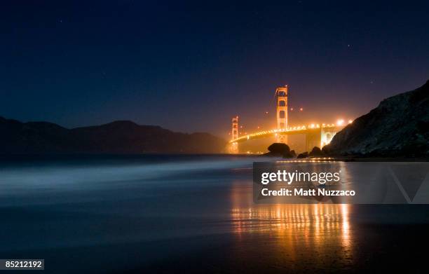 golden gate bridge under full moon - golden gate bridge night stock pictures, royalty-free photos & images