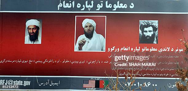 Billboard with the photos of Al-Qaeda mastermind Osama bin Laden , Adam Gadhan, an American born radical in charge of Al-Qaeda propaganda and Taliban...