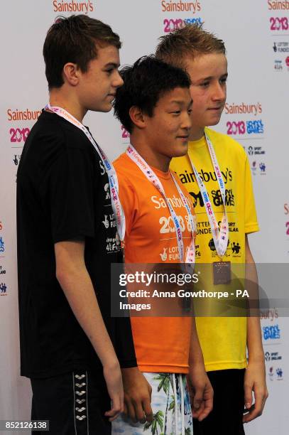 Mens 100m breaststroke medal winners during swimming on day three of the 2013 Sainsburys School Games at Ponds Forge, Sheffield. PRESS ASSOCIATION...