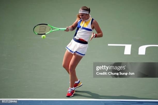 Jelena Ostapenko of Latvia plays a shot against Luksika Kumkhum of Thailand during day six of the KEB Hana Bank - Incheon Airport Korea Open at the...