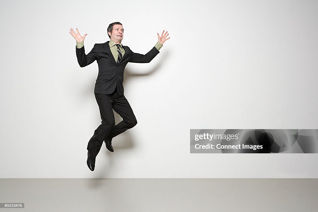 Businessman jumping