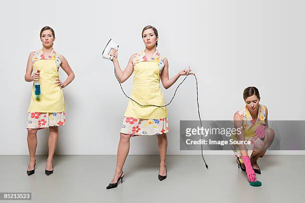 woman doing housework - multiple images of the same woman stock pictures, royalty-free photos & images