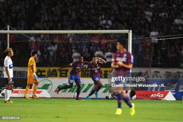 Dudu of Ventforet Kofu celebrates scoring his side's first goal with his team mate Lins during the J.League J1 match between Ventforet Kofu and...