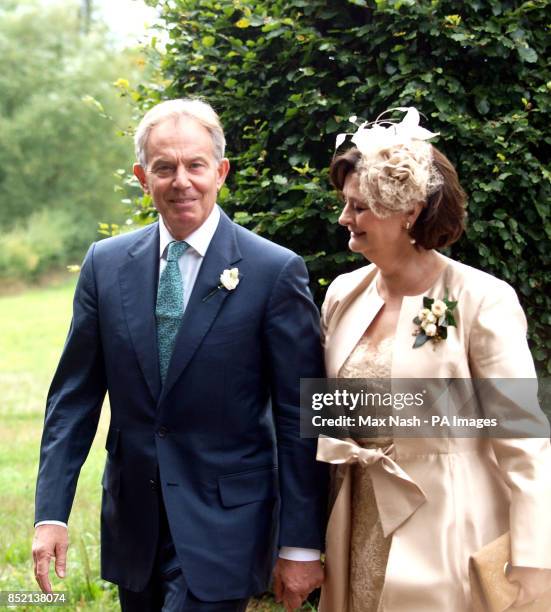 Former Prime Minister Tony Blair arrives with his wife Cherie Blair arriving for the wedding of their son Euan Blair to Suzanne Ashman at All Saints...