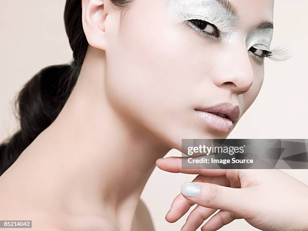 portrait of a young woman - silver make up stock pictures, royalty-free photos & images