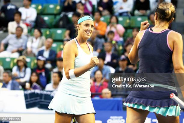 Andreja Klepac of Slovenia celebrates with doubles partner Maria Jose Martinez of Spain after defeating Daria Gavrilova of Australia and Daria...